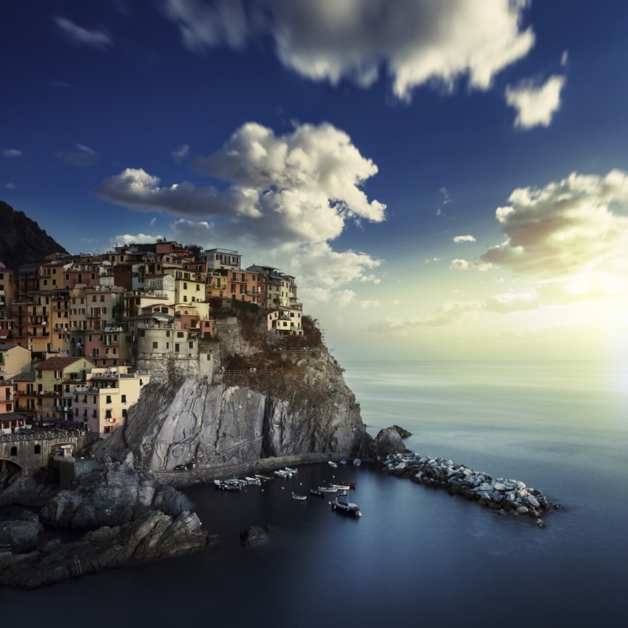 Posterazzi View of Manarola on the rocks at sunset La Spezia Liguria Northern Italy Poster Print